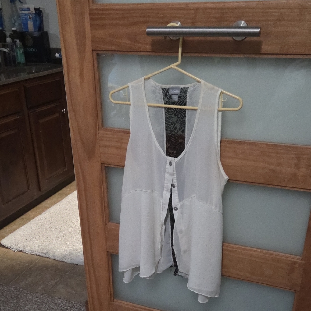 Vanity White Asymmetrical Sleeveless Blouse